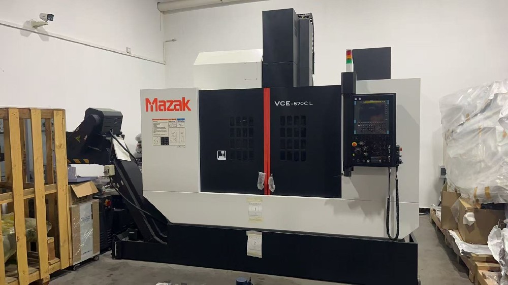 Newly arrived MAZAK  CNC equipment is being installed and debugged